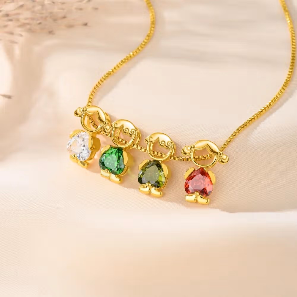 El vínculo imborrable de la familia: El collar de plata con contorno de niño y niña y piedras de nacimiento