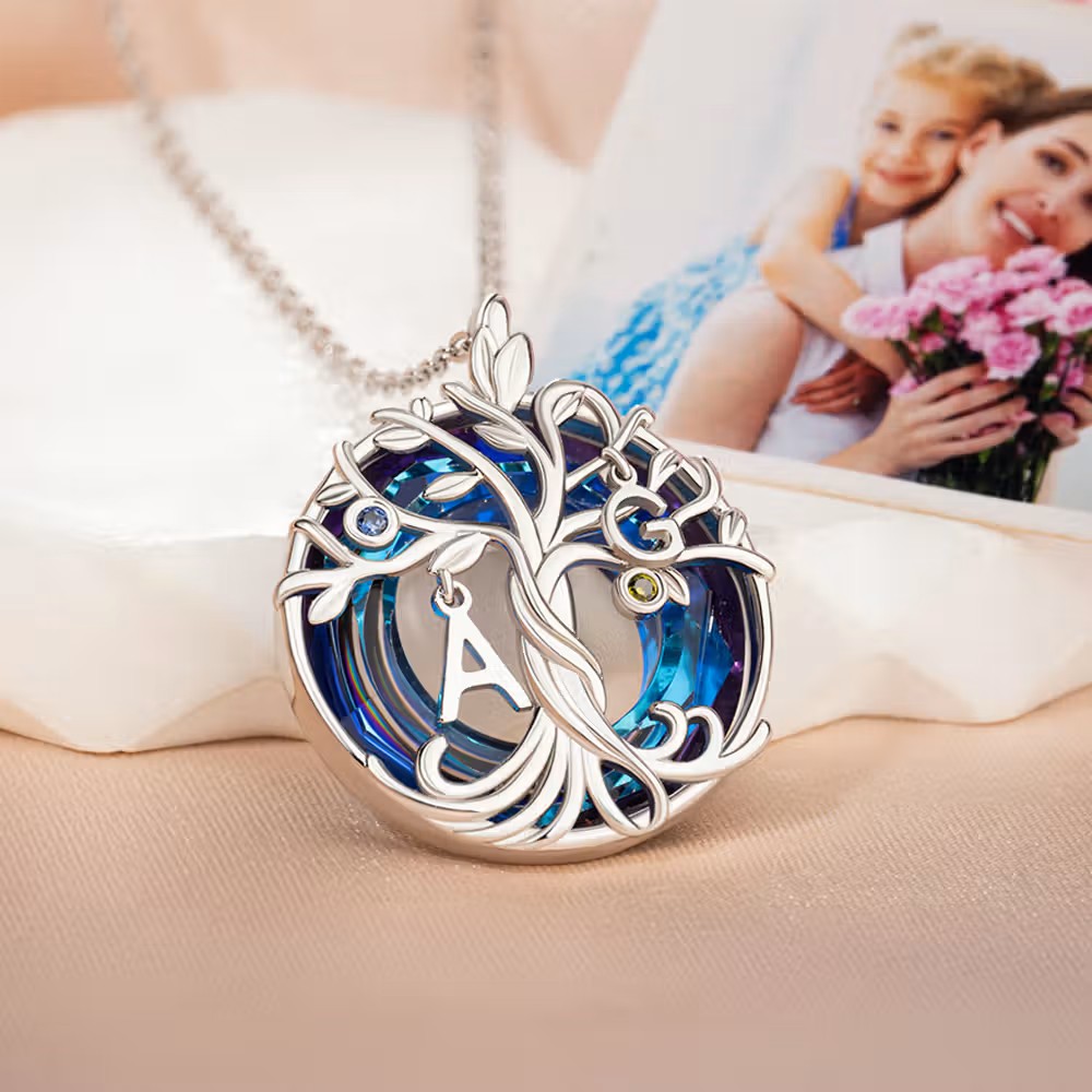La magia de las raíces: Collar árbol de la vida de cristal y plata esterlina